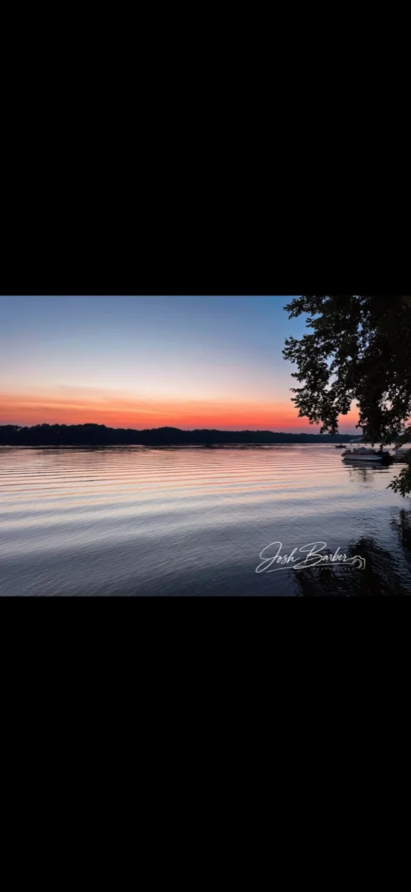 Lake at sunset with Josh Barber watermark